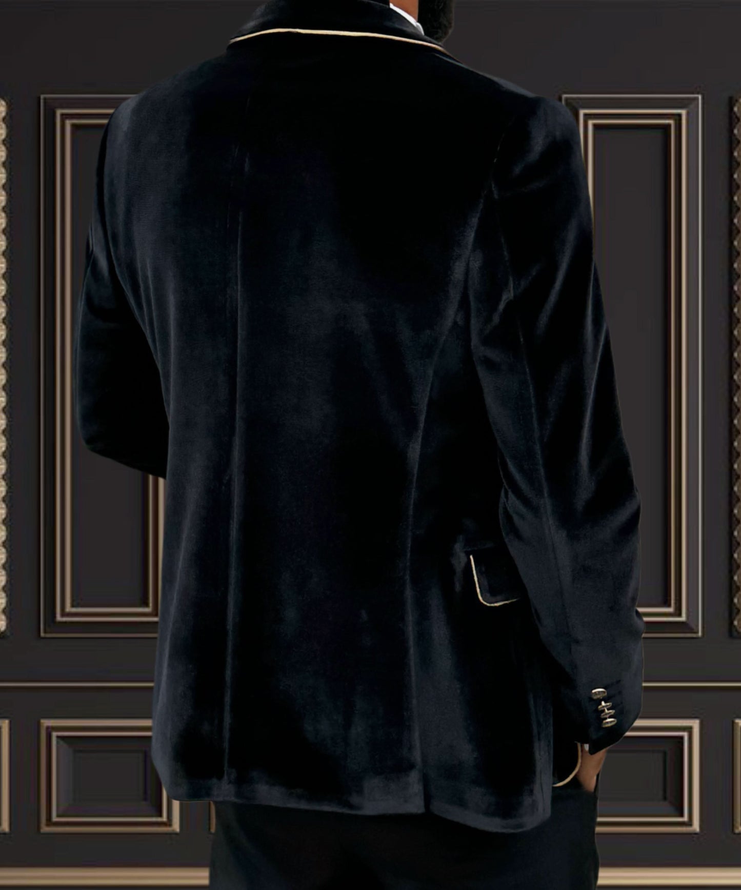 Men's black velvet tuxedo jacket with gold trimmed shawl lapel, showcasing elegant design from the back view.